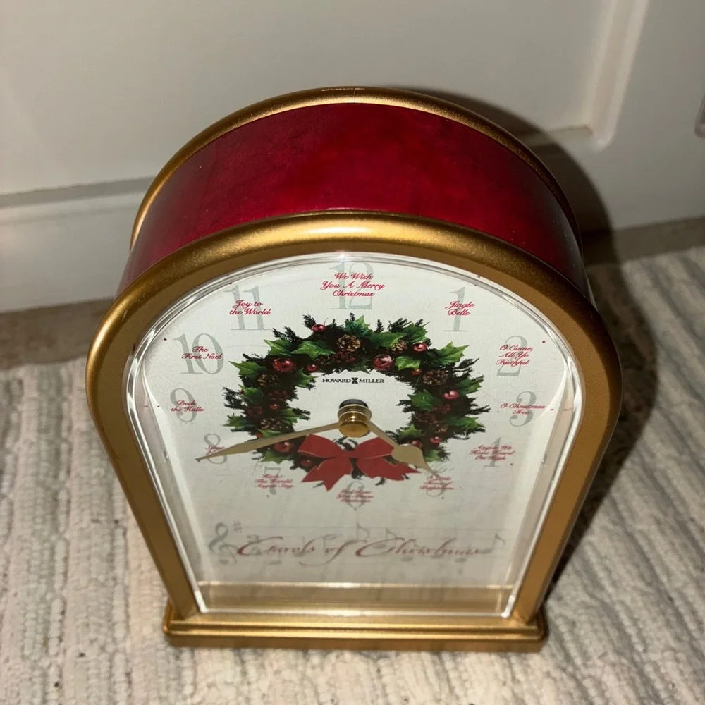 Red and Gold Christmas Howard Miller Clock.  Listen to video.